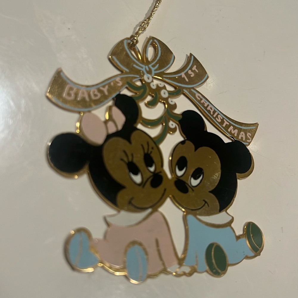 NWOT Disney baby’s first Christmas gold metal ornament